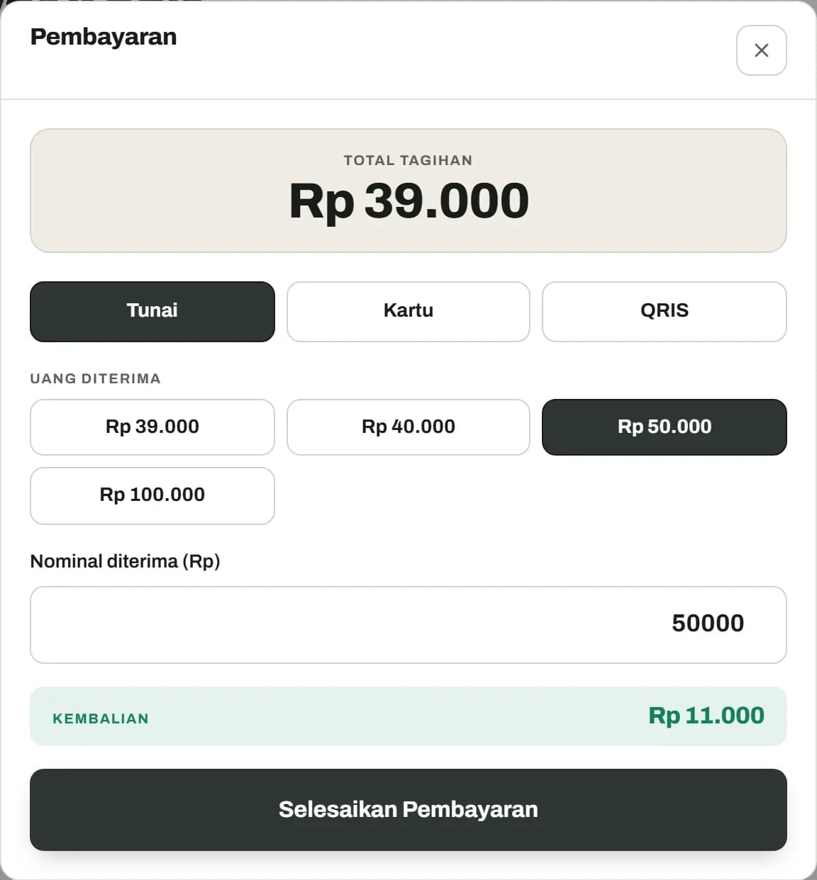 Dialog pembayaran tunai dengan uang diterima Rp 50.000 dan kembalian dihitung otomatis